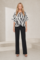 Blouse ample imprimé zébré col fendu