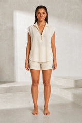 Ensemble short ample col zippé