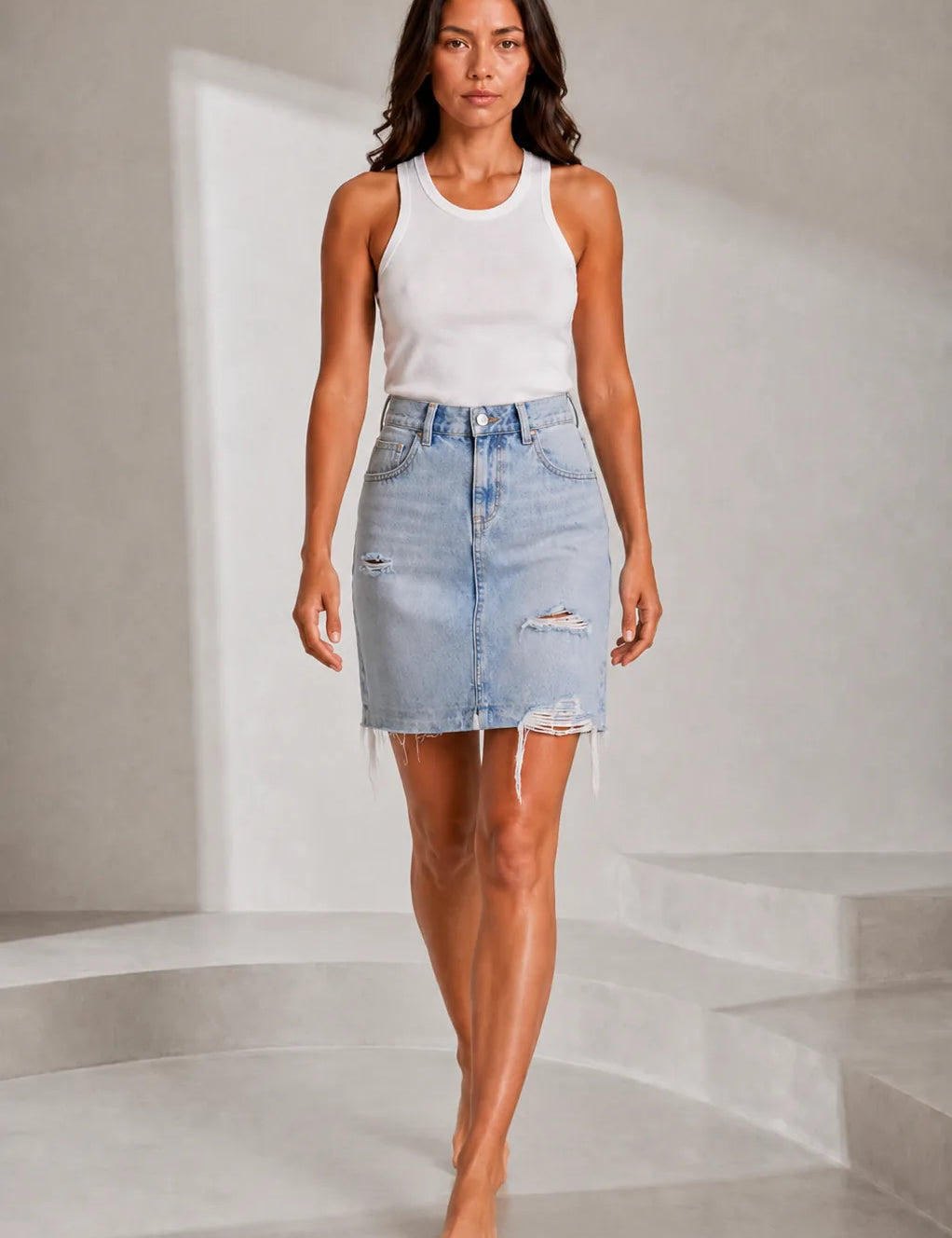 Jupe en jean bleu clair déchirée | Lounelle Paris