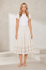 Jupe midi écrue ample à volants
