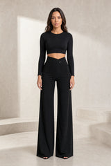 High-waisted flowing trousers with crossover belt
