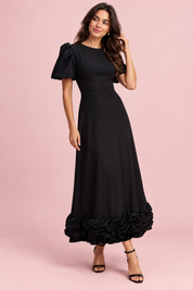 Robe longue noire à manches bouffantes et volant | Vue de face | Lounelle Paris