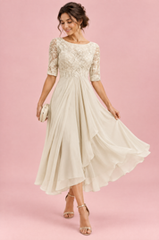 Robe en mousseline à corsage brodé ivoire | Vue en mouvement | Lounelle Paris