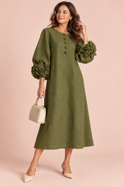 Robe midi vert olive coupe trapèze à manches bouffantes | Vue de face | Lounelle Paris
