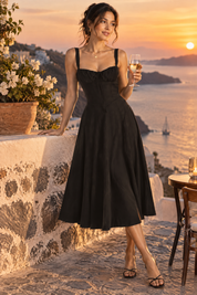 Robe midi noire à coupe trapèze et encolure carrée | Deuxième photo lifestyle | Lounelle Paris