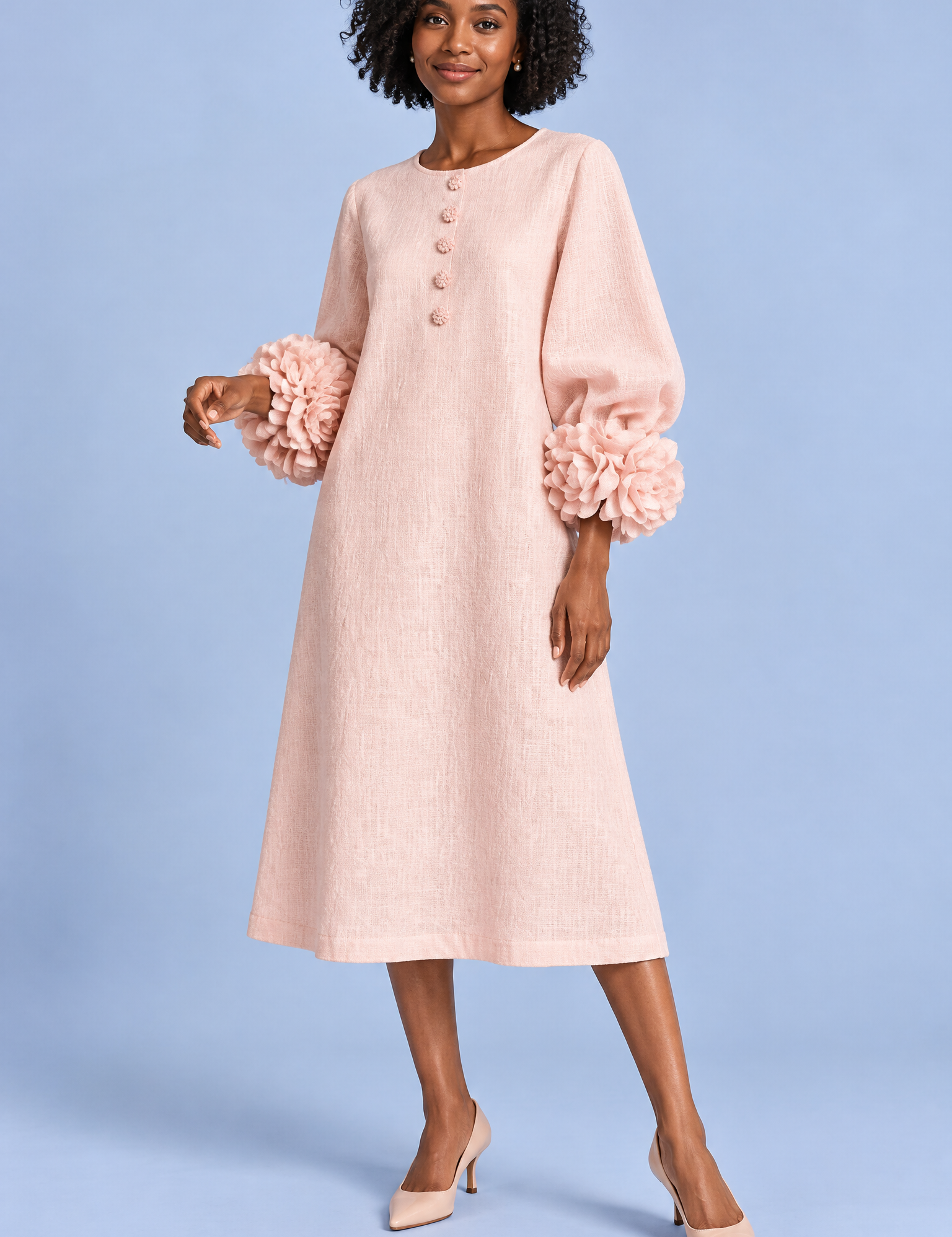 Robe midi rose coupe trapèze à manches bouffantes | Vue de face | Lounelle Paris