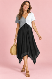 Robe midi noire asymétrique à col V | Vue de face | Lounelle Paris