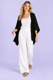 Gilet noir décontracté ouvert | Vue en mouvement | Lounelle Paris