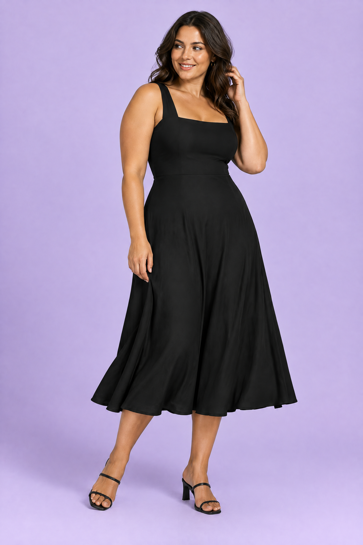 Robe midi noire à fines bretelles et jupe ample | Porté sur une autre silhouette | Lounelle Paris