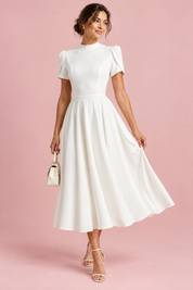 Robe midi blanche à col montant et manches bouffantes | Vue de face | Lounelle Paris