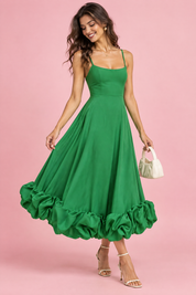 Robe midi verte évasée à bas volanté | Vue de face | Lounelle Paris